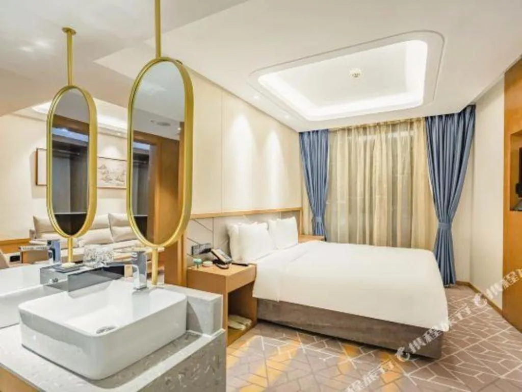 Bed in Gtel Rock City Qingdao Hotel