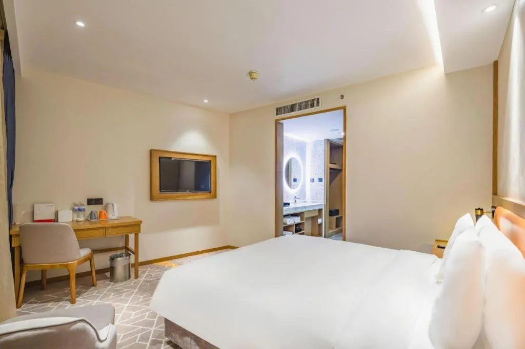 Bed in Gtel Rock City Qingdao Hotel