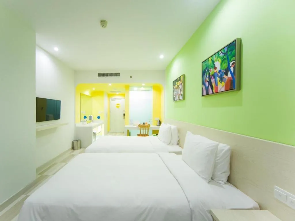 Bed in Gtel Rock City Qingdao Hotel