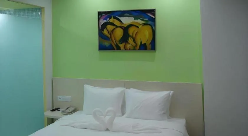 Bed in Gtel Rock City Qingdao Hotel