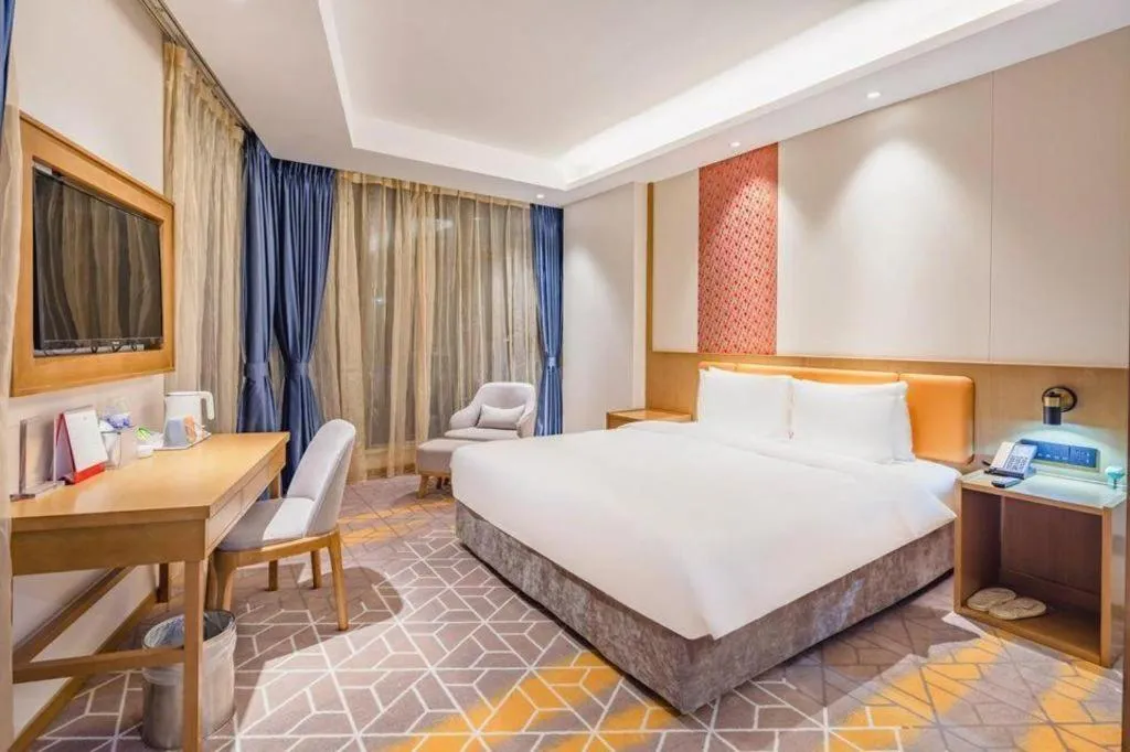 Bed in Gtel Rock City Qingdao Hotel