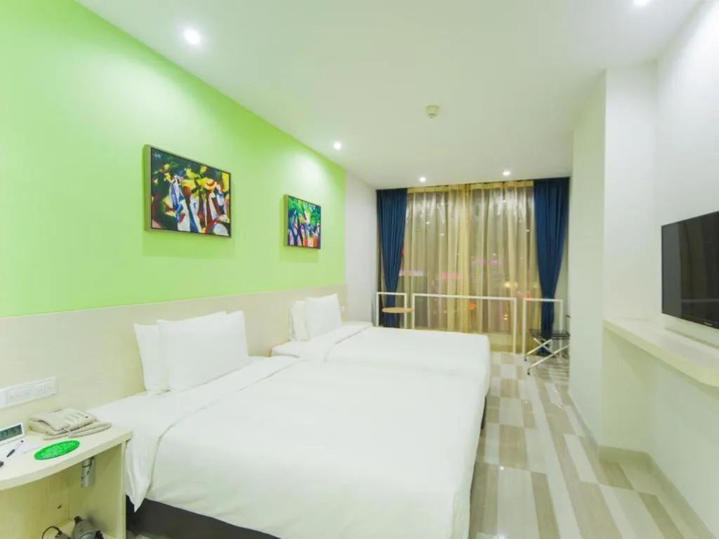 Bed in Gtel Rock City Qingdao Hotel