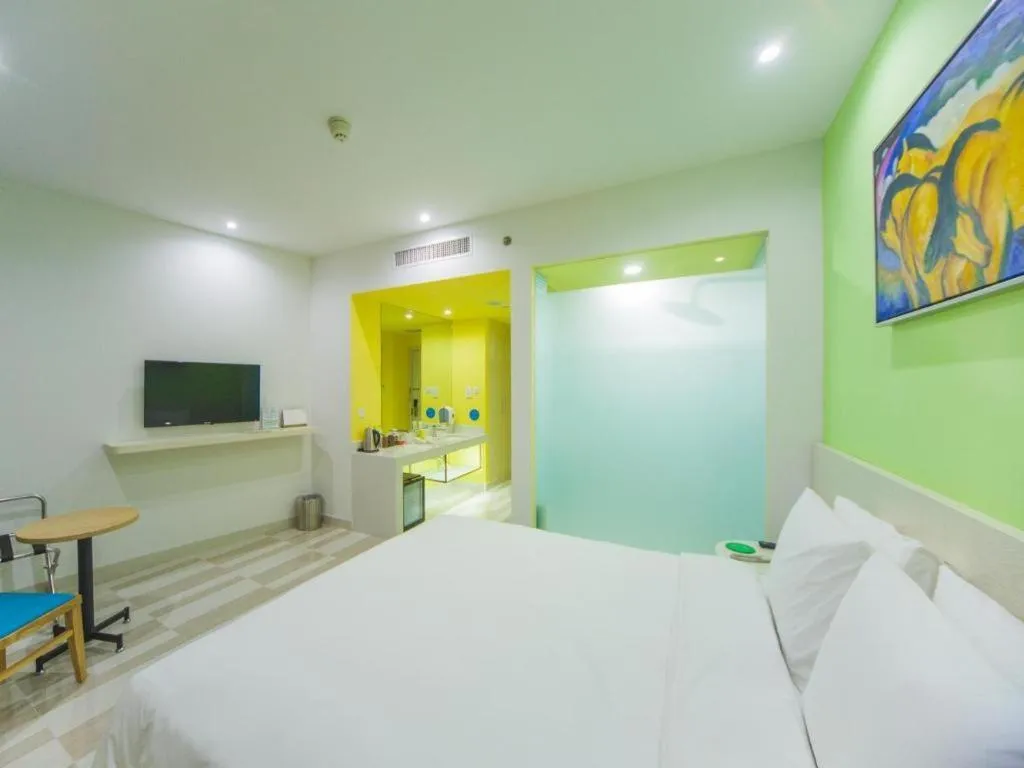 Bed in Gtel Rock City Qingdao Hotel