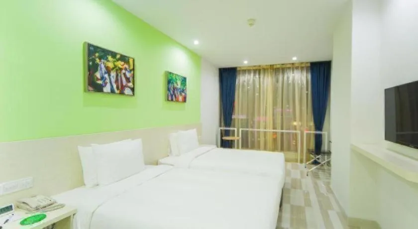 Bed in Gtel Rock City Qingdao Hotel