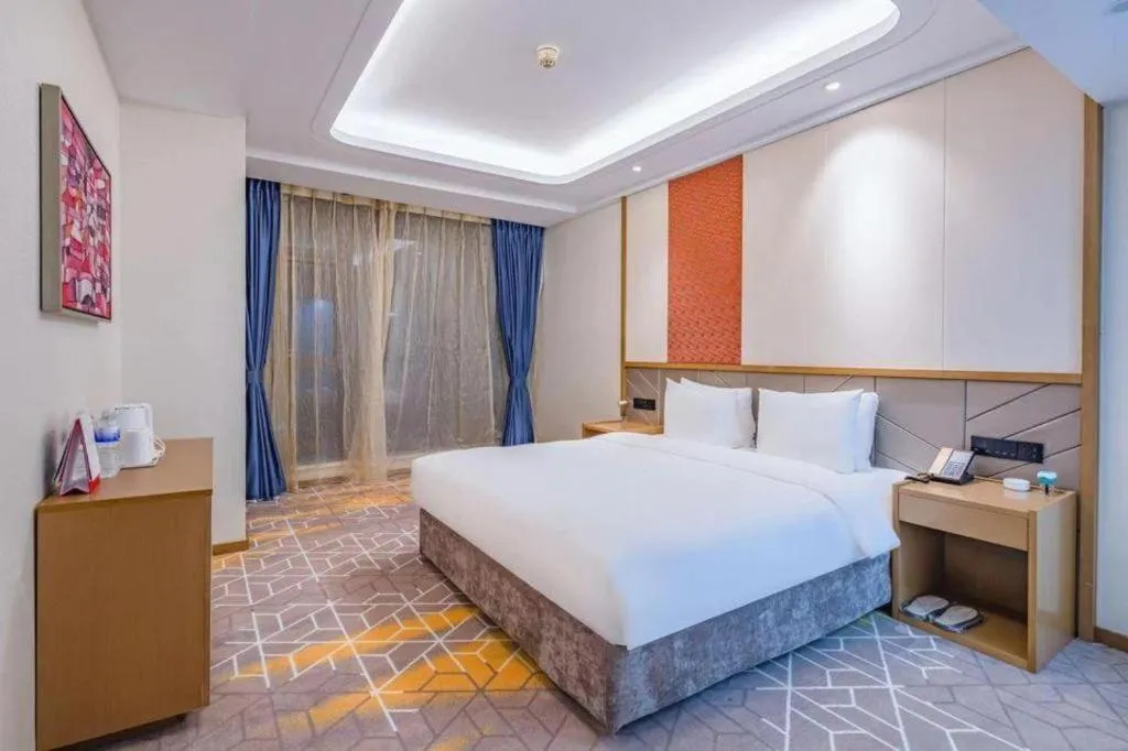 Bed in Gtel Rock City Qingdao Hotel