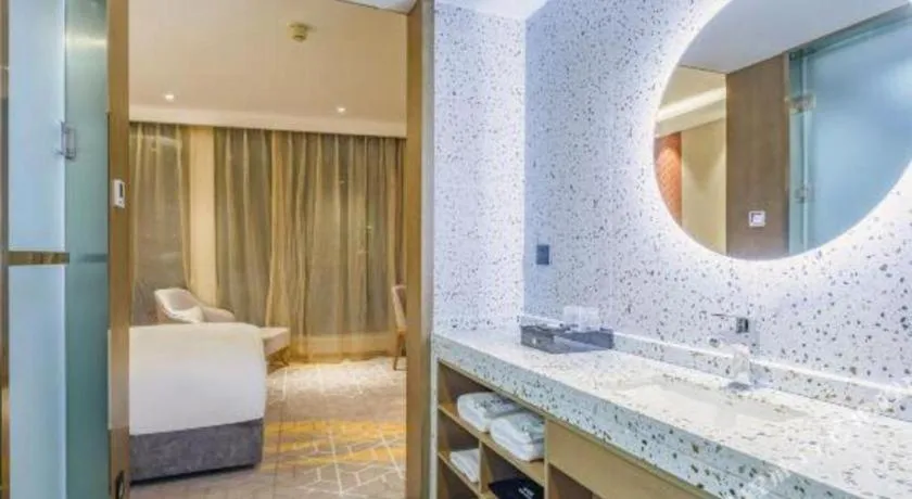 Bed in Gtel Rock City Qingdao Hotel