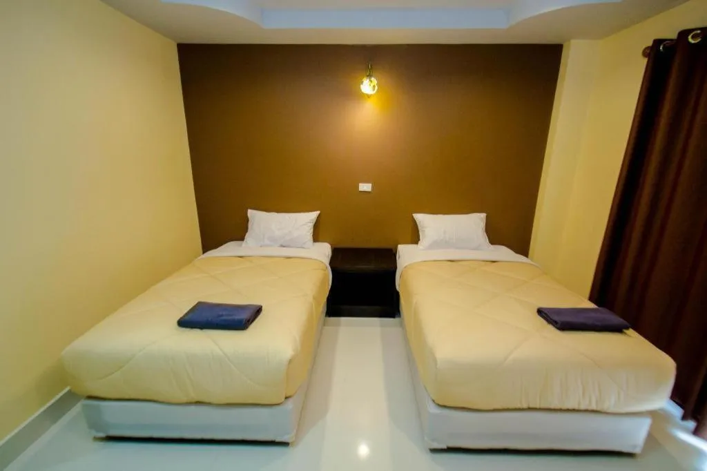 Bed in Maladee Hotel