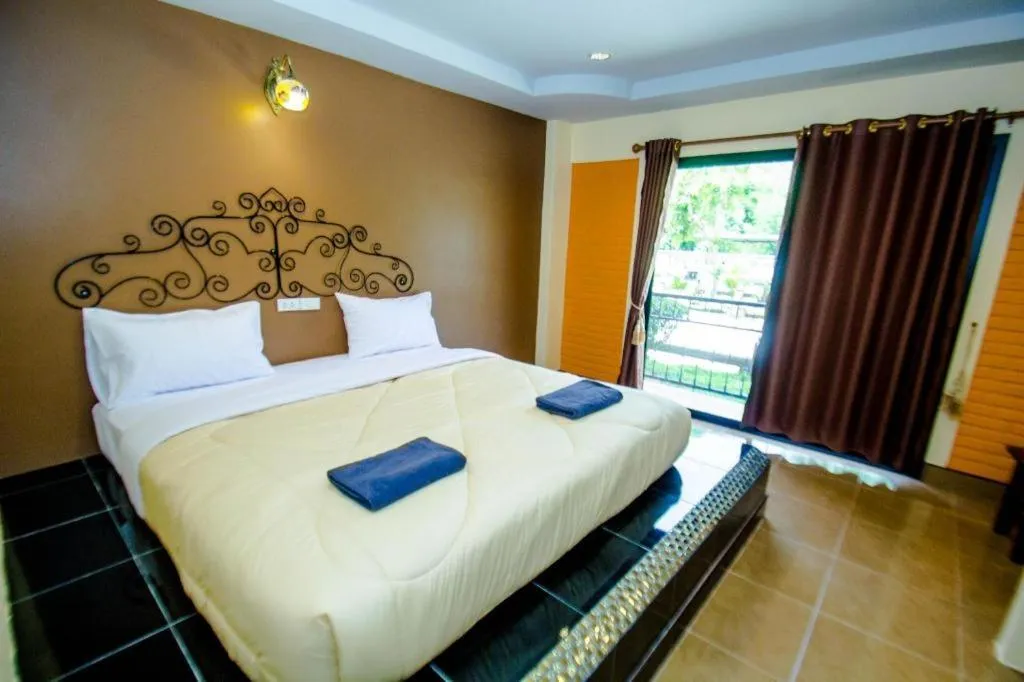 Bed in Maladee Hotel