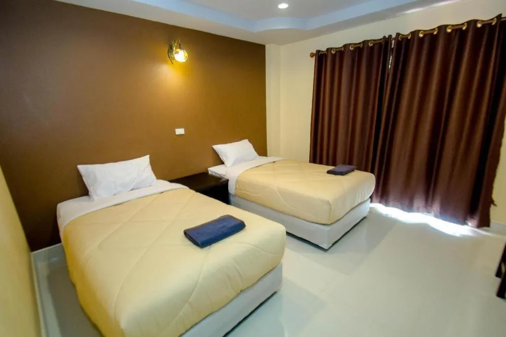Bed in Maladee Hotel