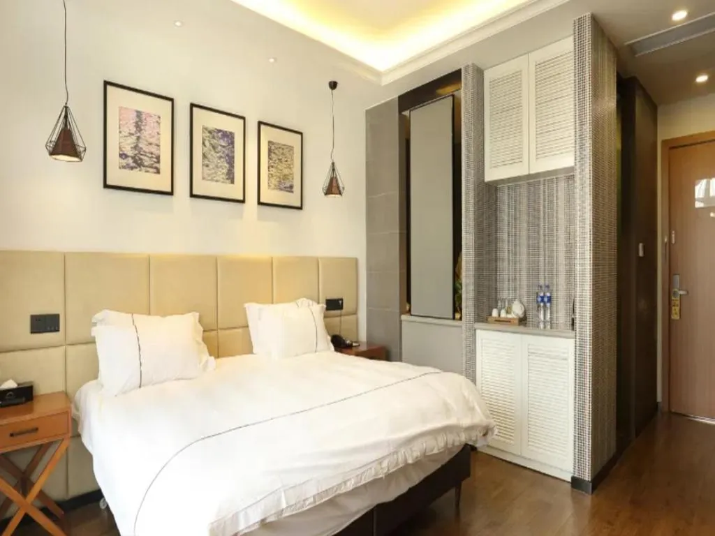 Bed in Muyra Hotel Shanghai
