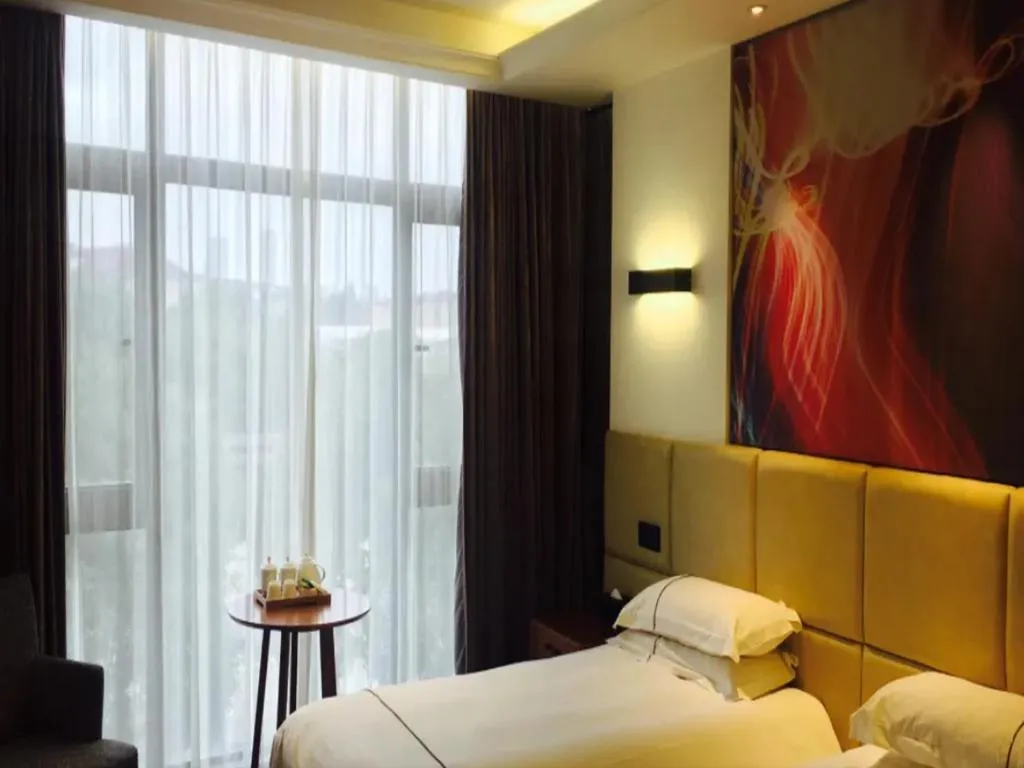 Bed in Muyra Hotel Shanghai