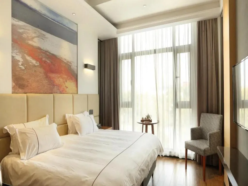 Bed in Muyra Hotel Shanghai