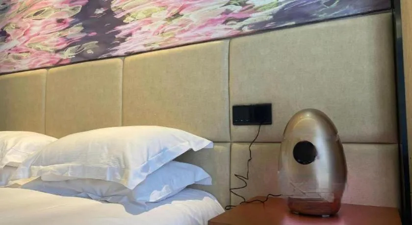 Bed in Muyra Hotel Shanghai