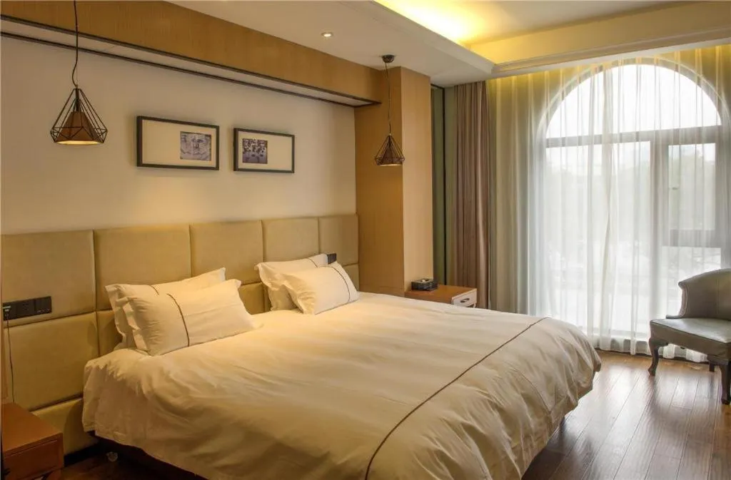 Bed in Muyra Hotel Shanghai