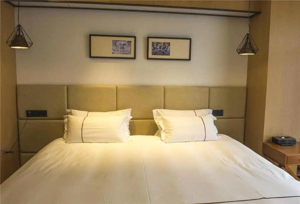 Bed in Muyra Hotel Shanghai