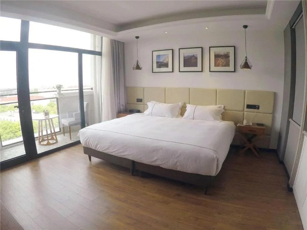 Bed in Muyra Hotel Shanghai