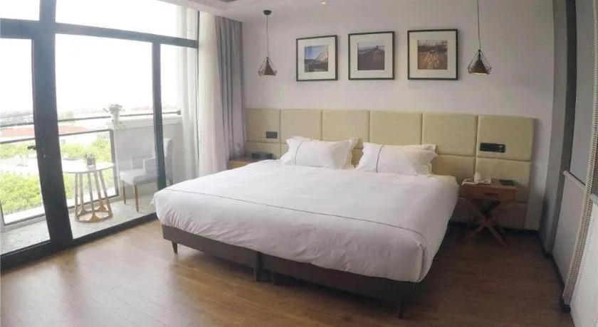 Bed in Muyra Hotel Shanghai