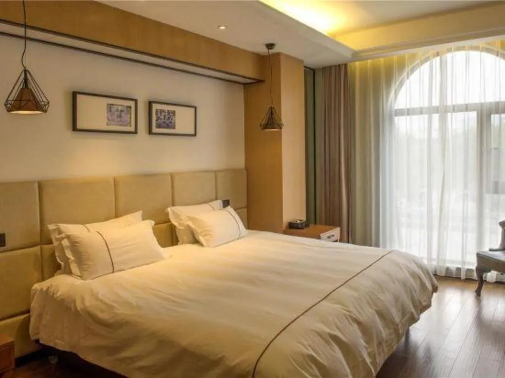 Bed in Muyra Hotel Shanghai