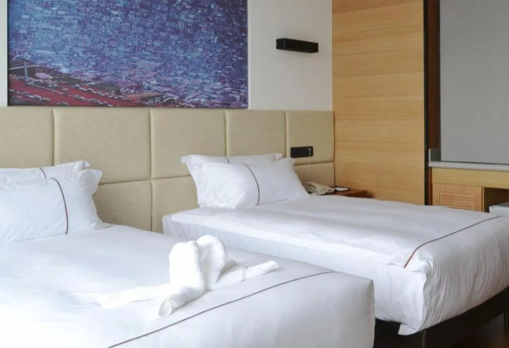 Bed in Muyra Hotel Shanghai