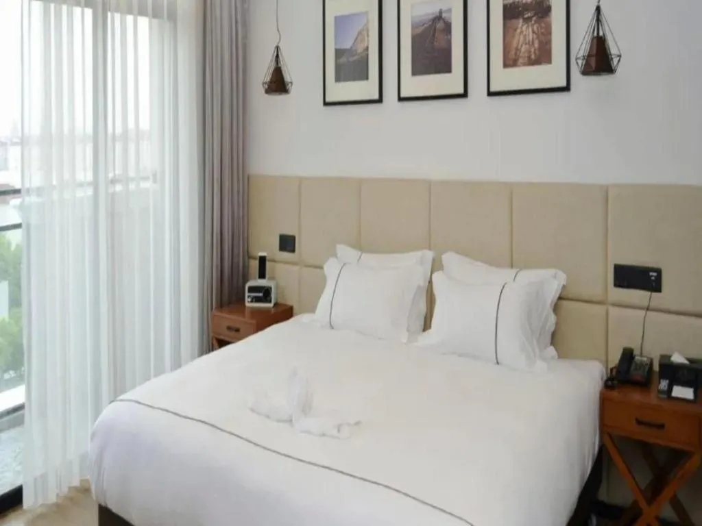 Bed in Muyra Hotel Shanghai