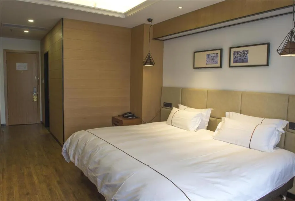 Bed in Muyra Hotel Shanghai