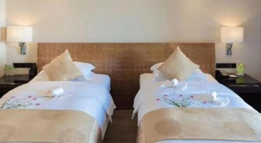 Bed in Hainan Yatai Hot Spring Hotel