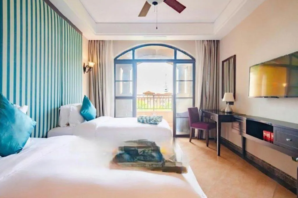 Bed in Hainan Yatai Hot Spring Hotel