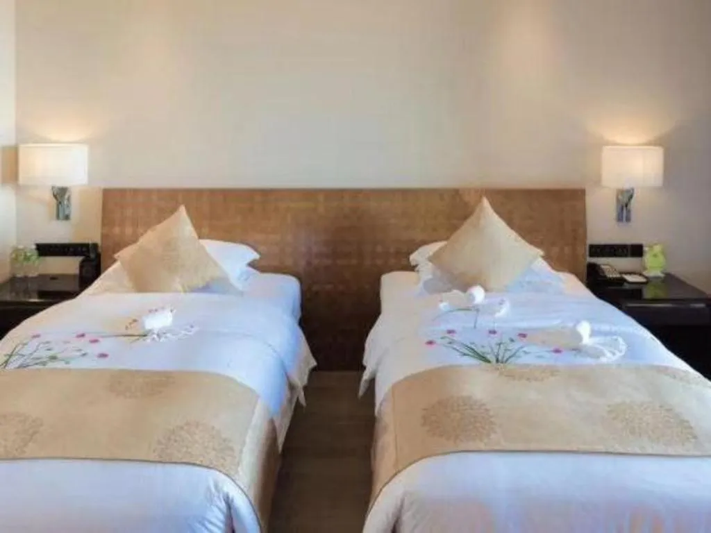 Bed in Hainan Yatai Hot Spring Hotel