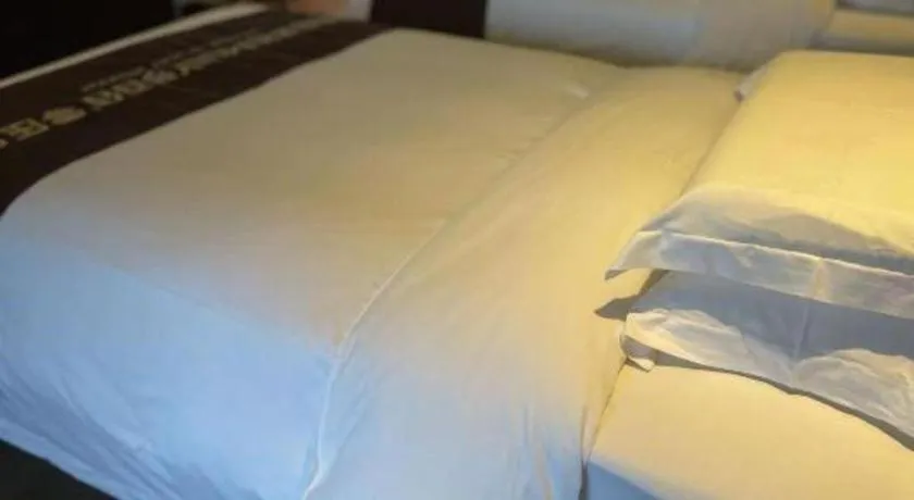 Bed in Hainan Yatai Hot Spring Hotel