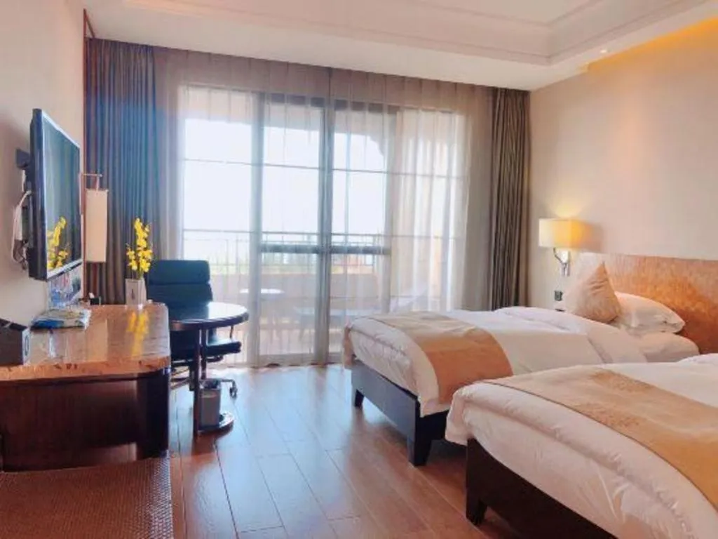 Bed in Hainan Yatai Hot Spring Hotel