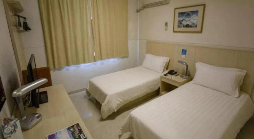 Bed in Jinjiang Inn Shanghai Baoshan Shengqiao