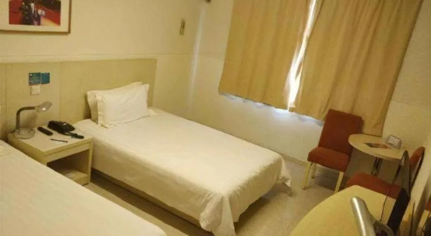 Bed in Jinjiang Inn Shanghai Baoshan Shengqiao