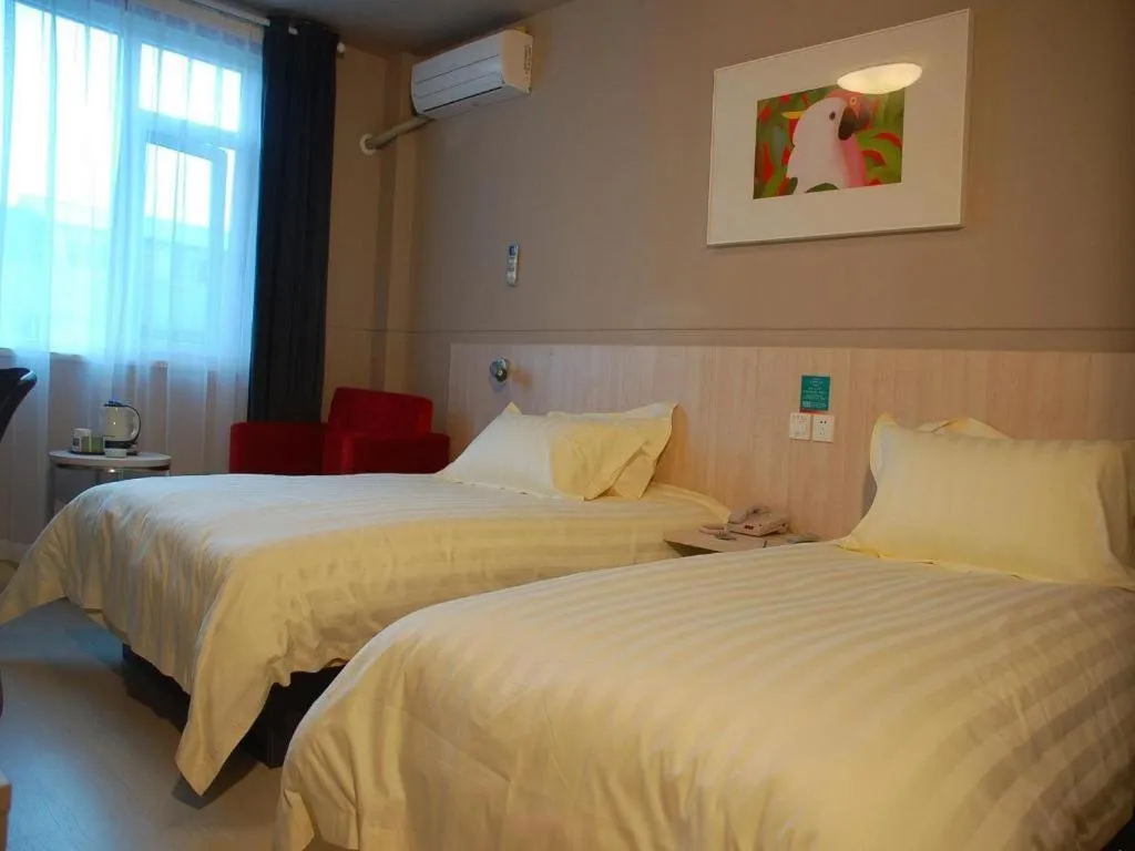 Bed in Jinjiang Inn Shanghai Baoshan Shengqiao