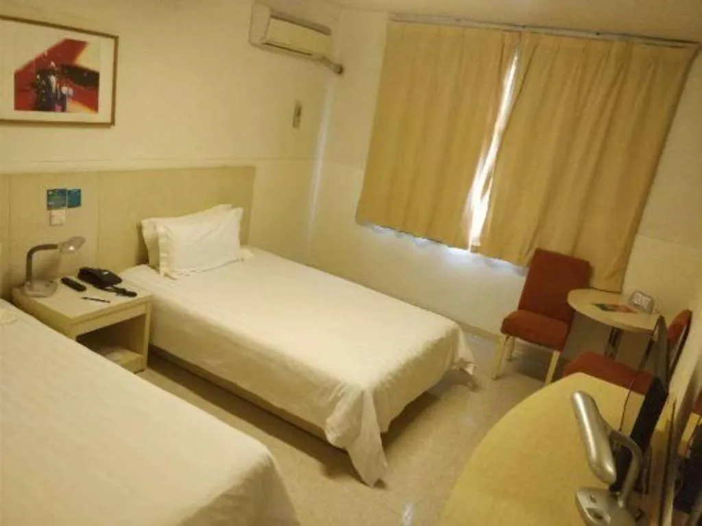 Bed in Jinjiang Inn Shanghai Baoshan Shengqiao