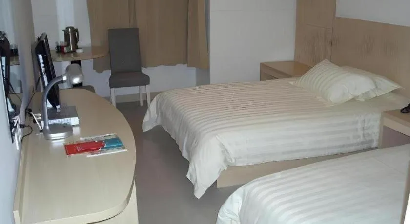 Bed in Jinjiang Inn Shanghai Baoshan Shengqiao