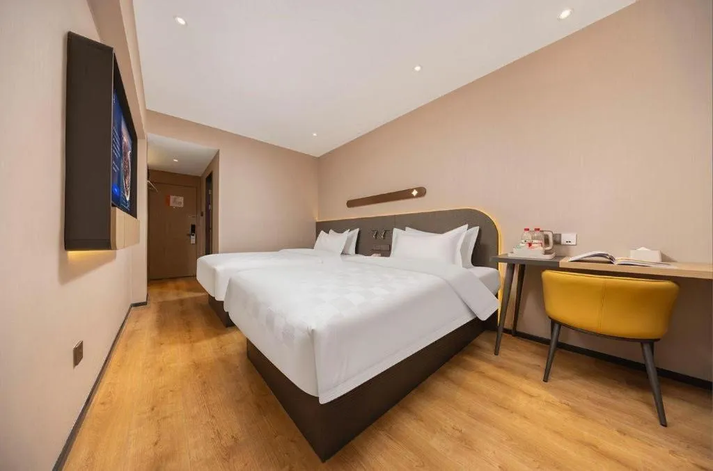 Bed in Jinjiang Inn Henan Museum Hutun Metro Station