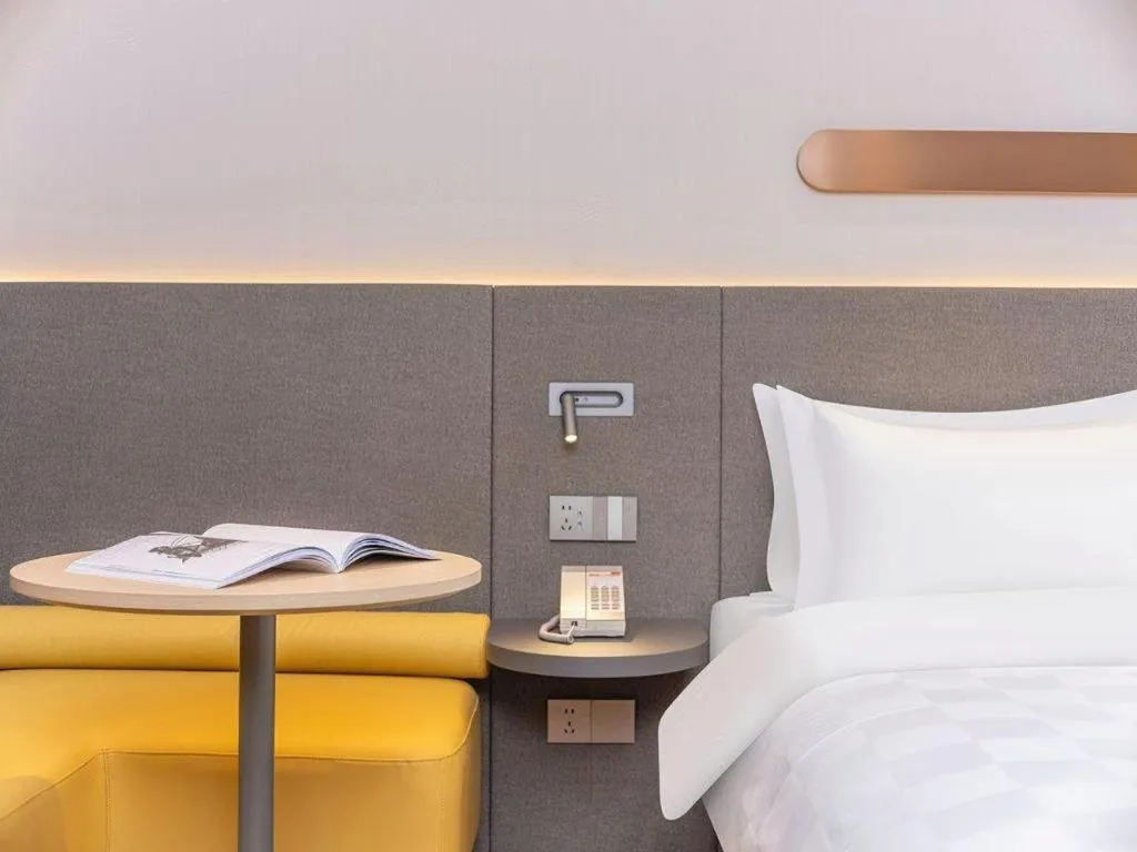 Bed in Jinjiang Inn Henan Museum Hutun Metro Station