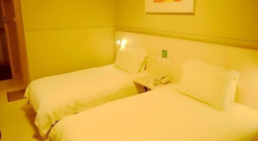 Bed in Jinjiang Inn Changzhou Global Dinosaur City Olympic Center