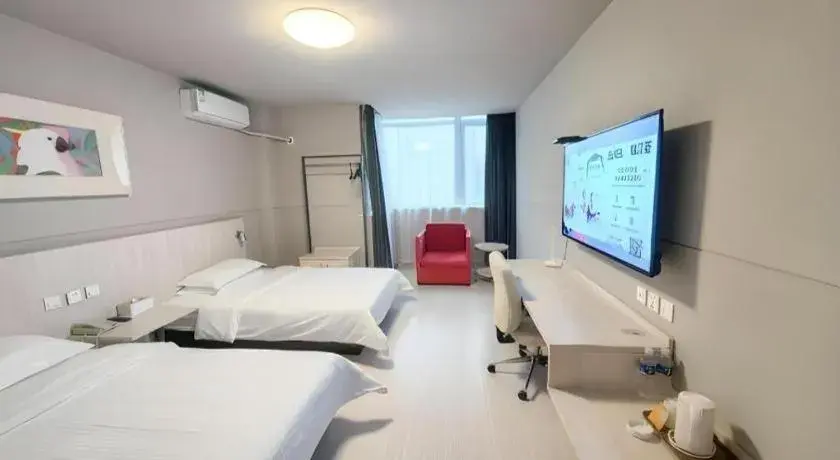 Bed in Jinjiang Inn Changzhou Global Dinosaur City Olympic Center Bed in Jinjiang Inn Changzhou Global Dinosaur City Olympic Center