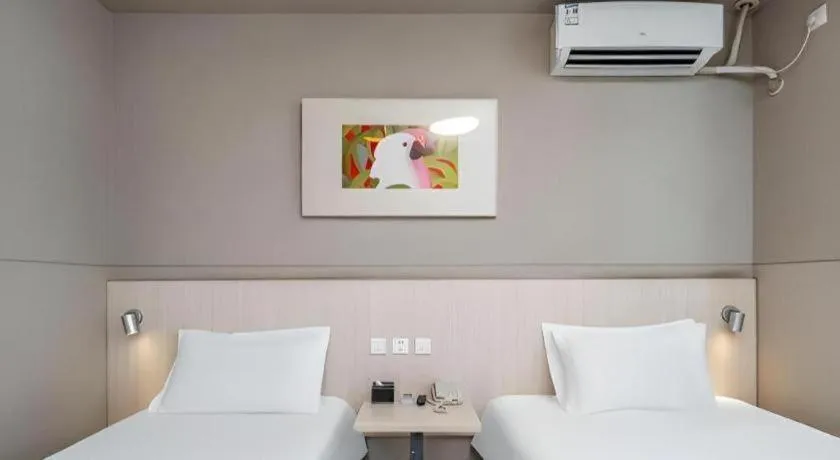 Bed in Jinjiang Inn Changzhou Global Dinosaur City Olympic Center