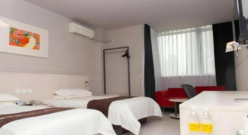 Bed in Jinjiang Inn Changzhou Global Dinosaur City Olympic Center Bed in Jinjiang Inn Changzhou Global Dinosaur City Olympic Center