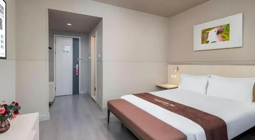 Bed in Jinjiang Inn Changzhou Global Dinosaur City Olympic Center Bed in Jinjiang Inn Changzhou Global Dinosaur City Olympic Center