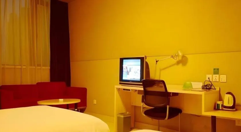 Bed in Jinjiang Inn Changzhou Global Dinosaur City Olympic Center