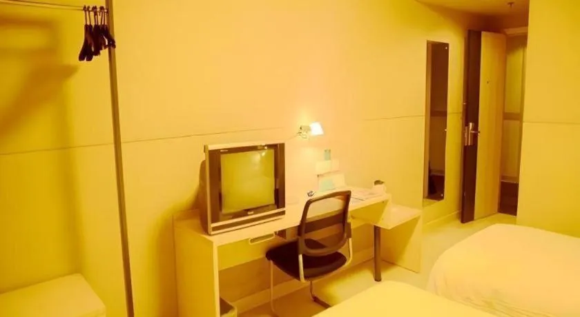 Bed in Jinjiang Inn Changzhou Global Dinosaur City Olympic Center