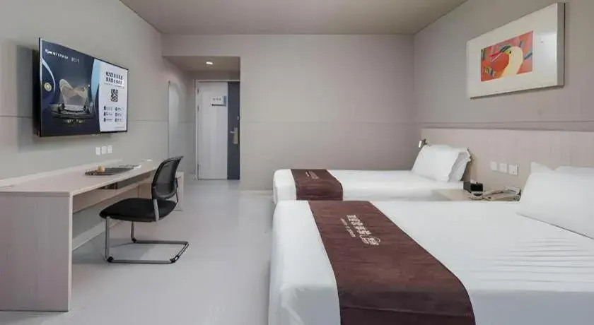 Bed in Jinjiang Inn Changzhou Global Dinosaur City Olympic Center Bed in Jinjiang Inn Changzhou Global Dinosaur City Olympic Center