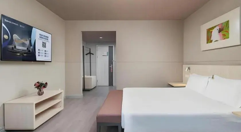 Bed in Jinjiang Inn Changzhou Global Dinosaur City Olympic Center Bed in Jinjiang Inn Changzhou Global Dinosaur City Olympic Center