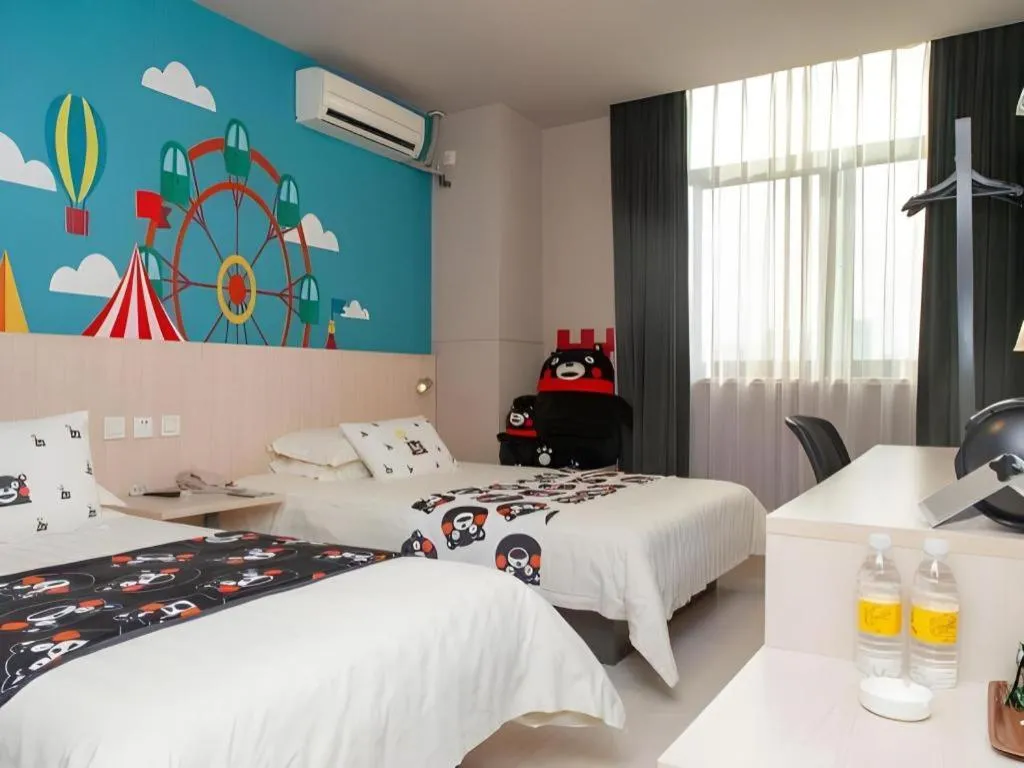 Bed in Jinjiang Inn Changzhou Global Dinosaur City Olympic Center