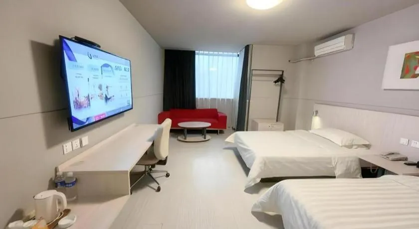 Bed in Jinjiang Inn Changzhou Global Dinosaur City Olympic Center