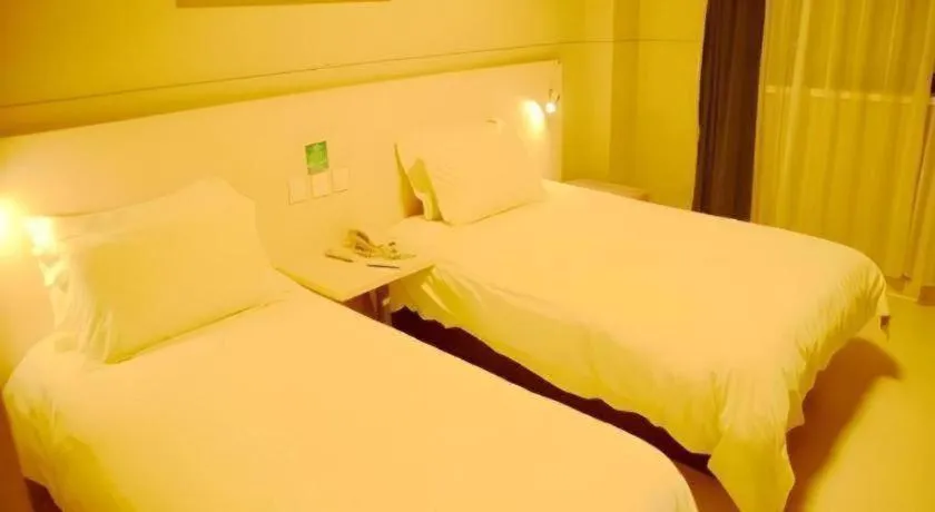 Bed in Jinjiang Inn Changzhou Global Dinosaur City Olympic Center