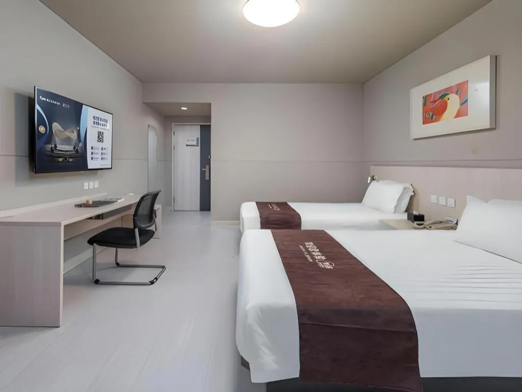 Bed in Jinjiang Inn Changzhou Global Dinosaur City Olympic Center